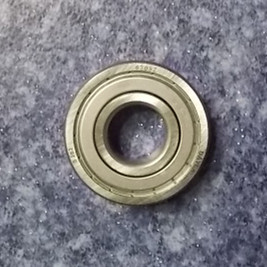 Transmission one-axis guide bearing