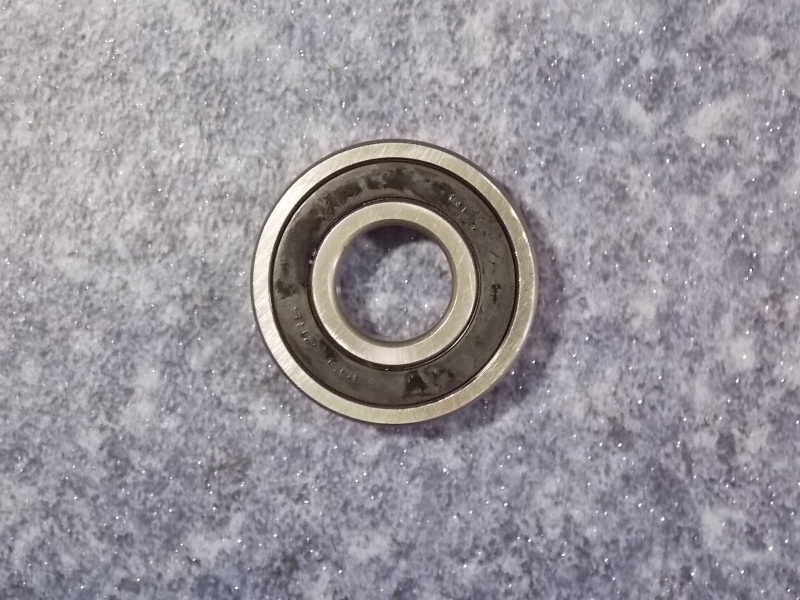 Transmission one-axis guide bearing