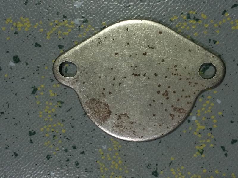 Flywheel housing cover plate