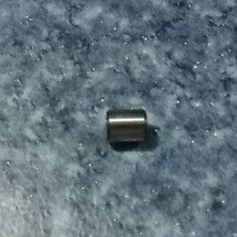 Camshaft bearing cover positioning sleeve