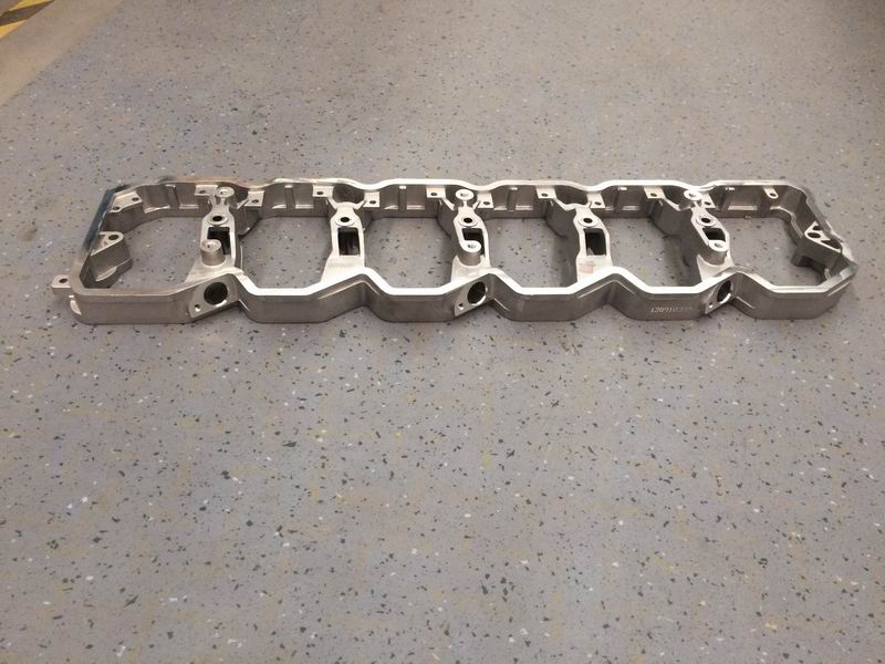 Rocker chamber housing