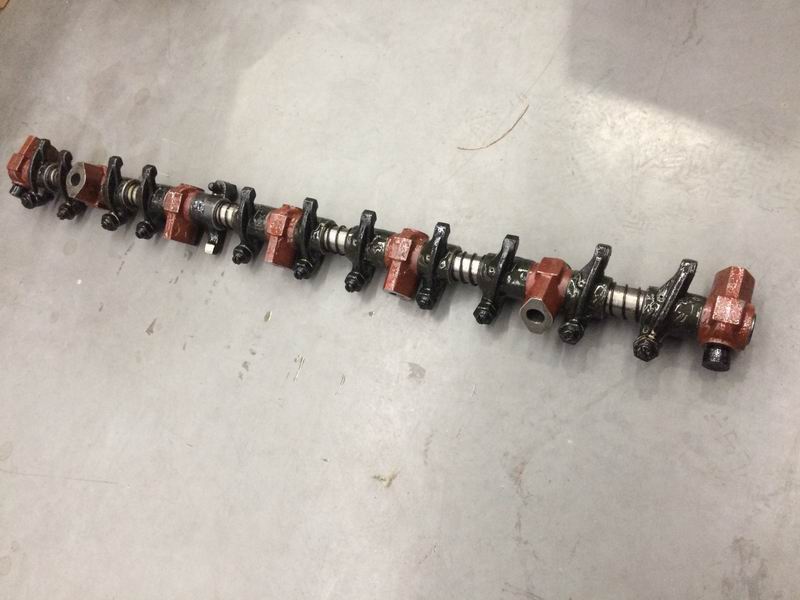 Rocker and rocker shaft