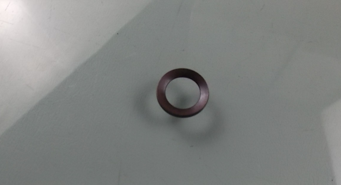 Exhaust manifold nut gasket