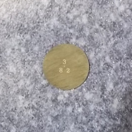 Valve clearance adjustment plate