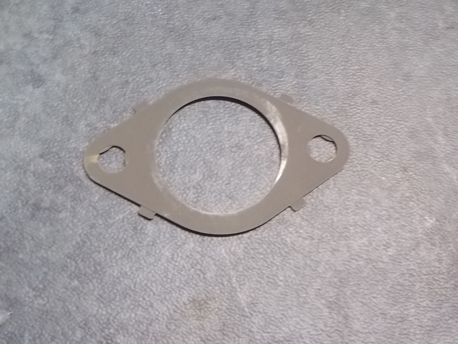 Exhaust manifold pad