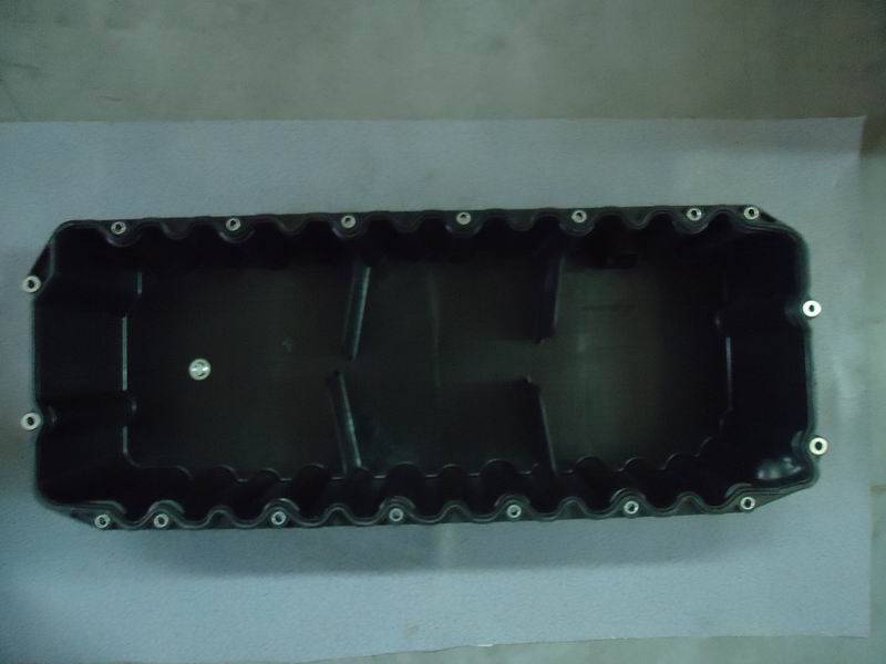 Oil pan and pad assembly