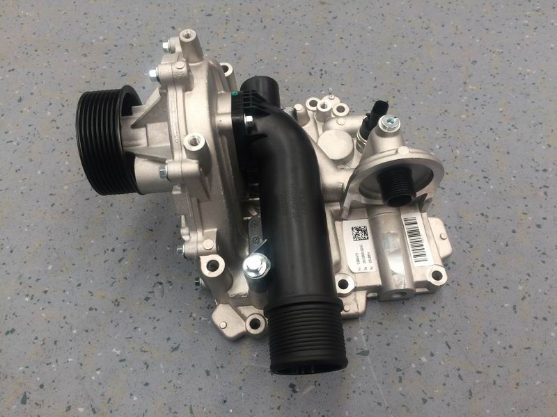 Engine oil cooler and water pump components