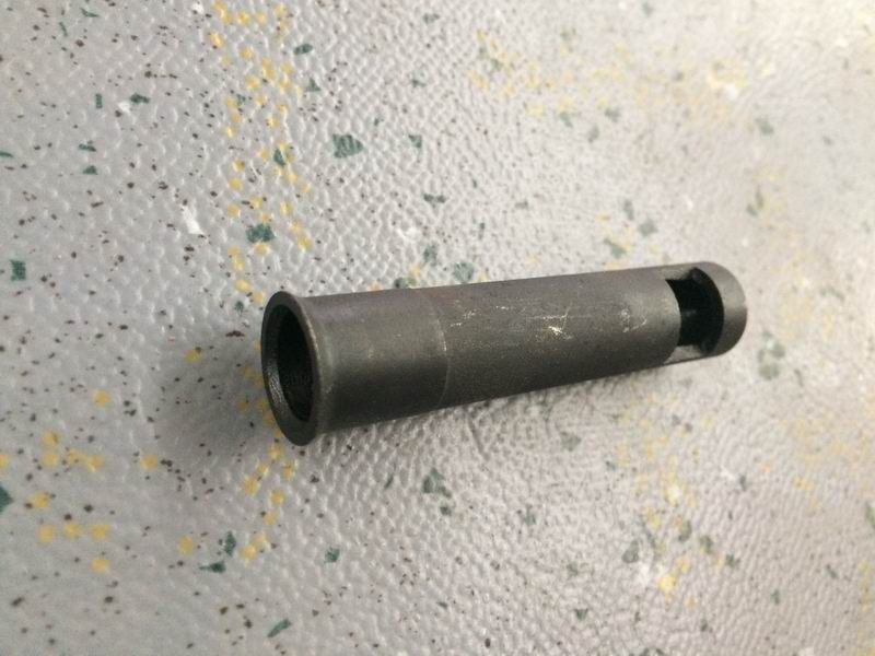 Machine filter oil discharge conduit