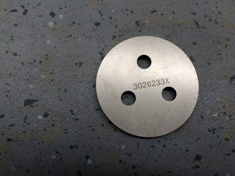 Water pump idler gear baffle