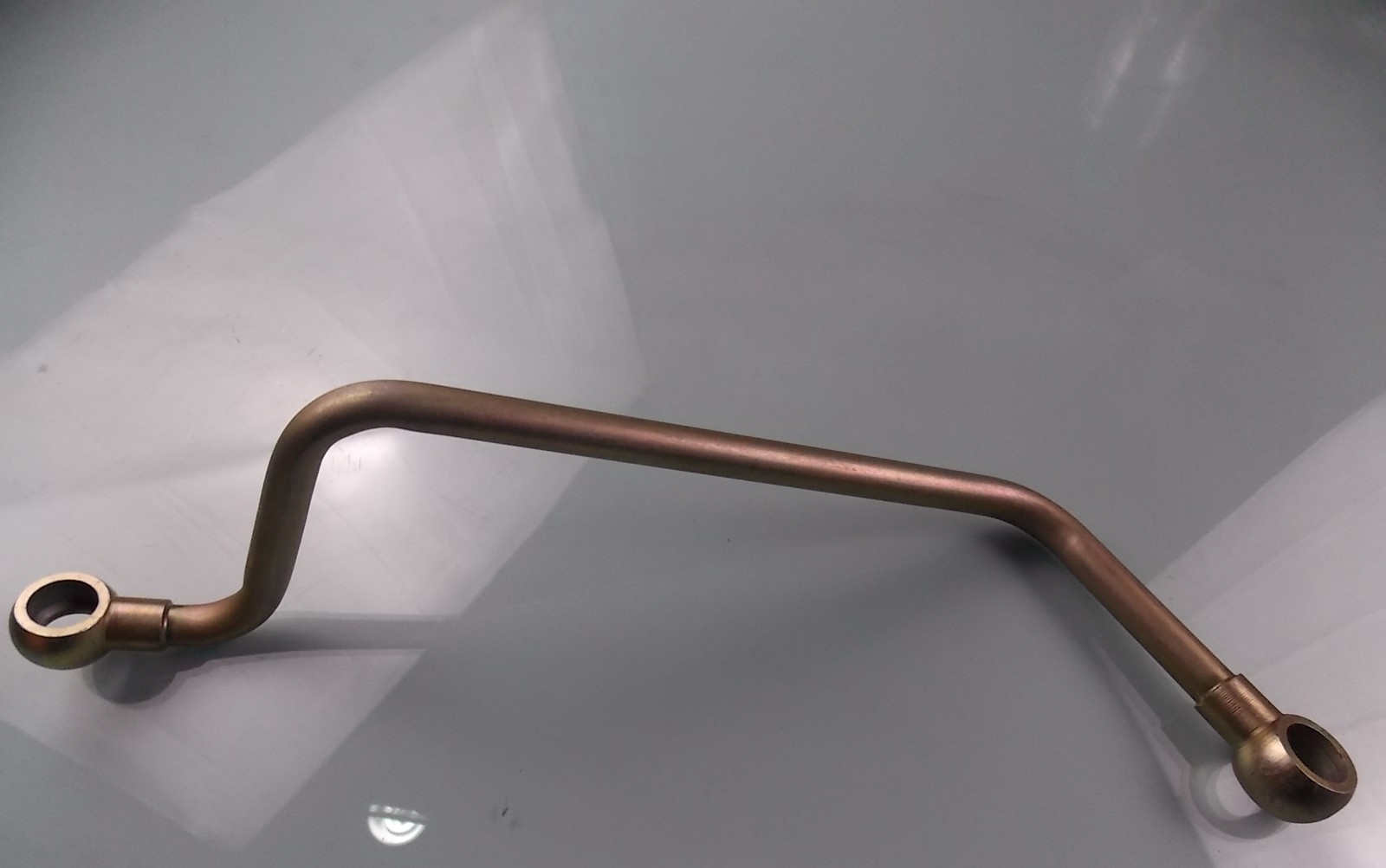 Air compressor oil return pipe