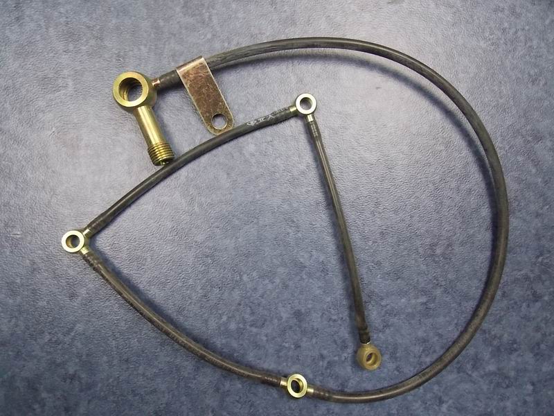 Fuel injector return pipe