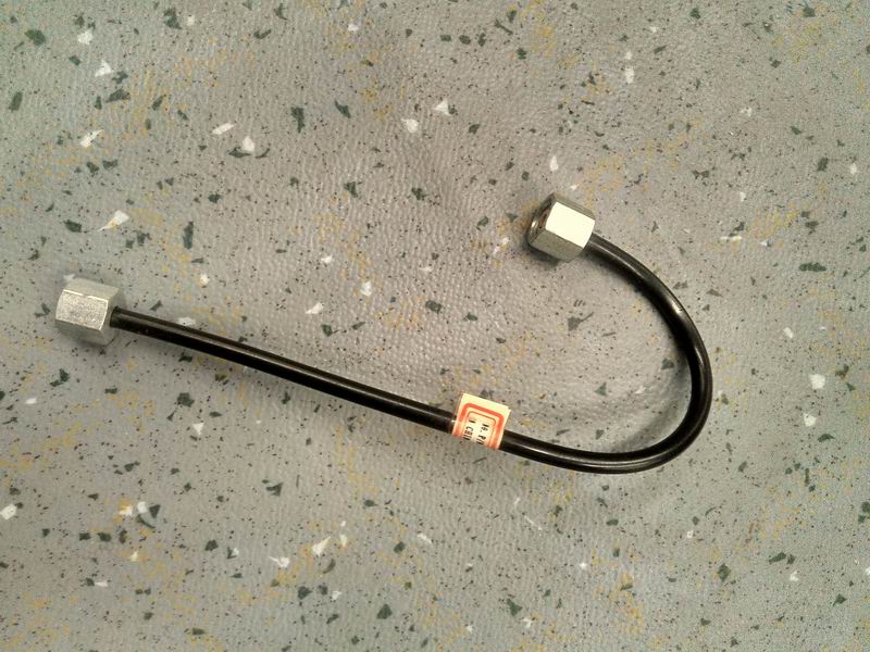 Supercharge compensator connection tube