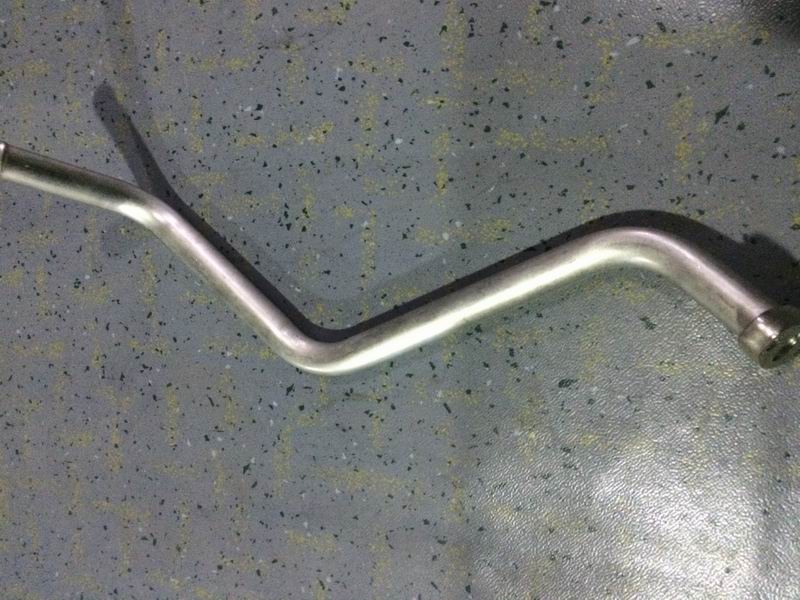 Supercharge compensator connection tube