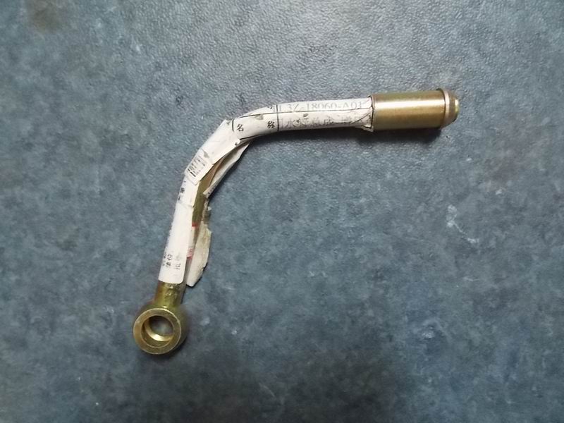 Supercharger return pipe