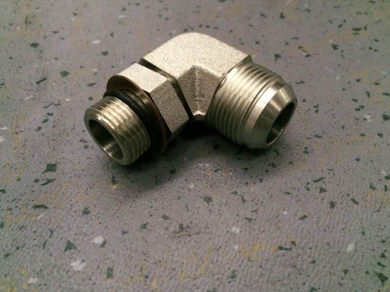 Supercharger return pipe joint