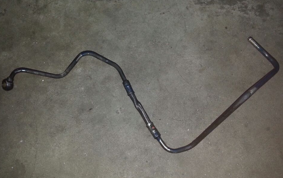 Supercharger outlet pipe