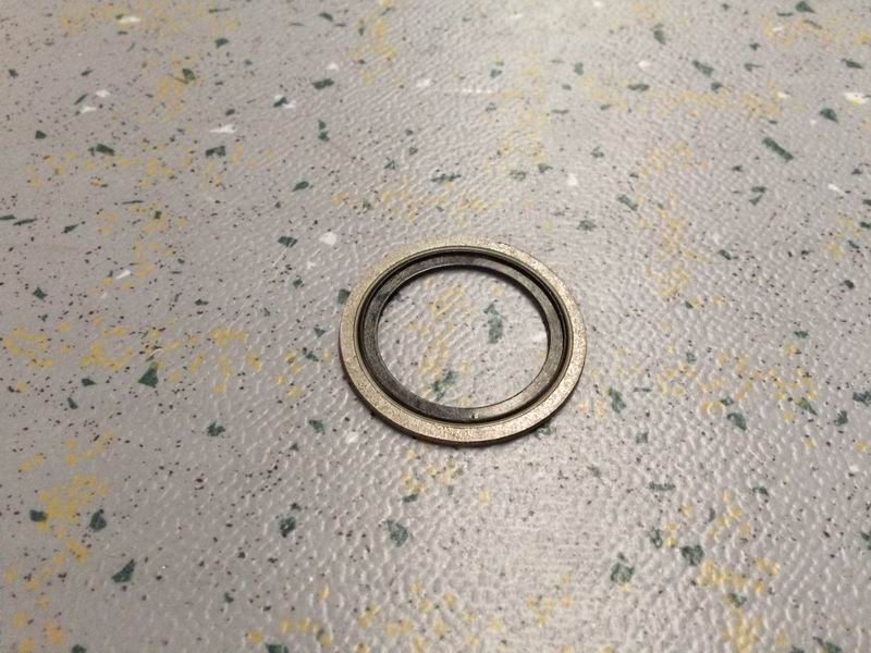 Supercharger return pipe seal ring