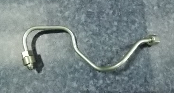 Common rail oil inlet pipe; inside the cylinder head