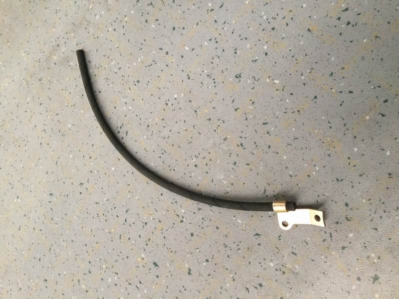 Wire harness pressure plate and traction pipe assembly