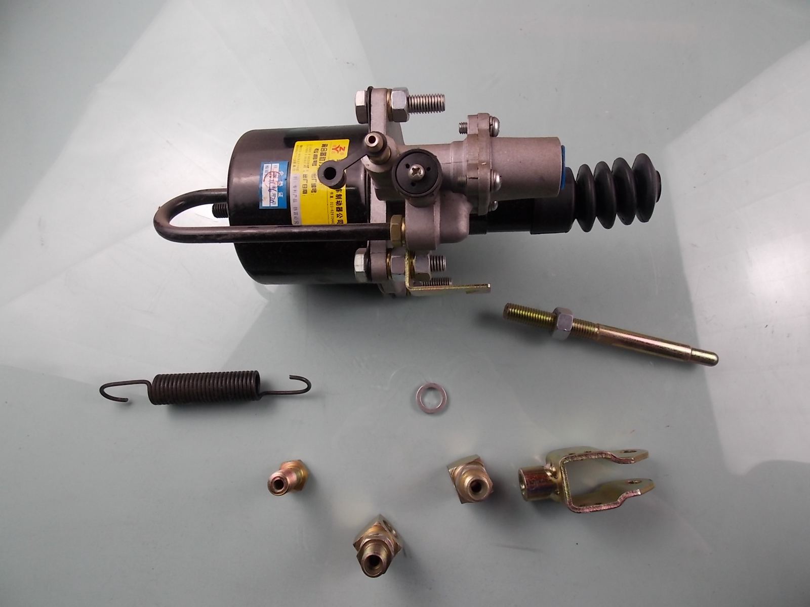 Clutch booster assembly