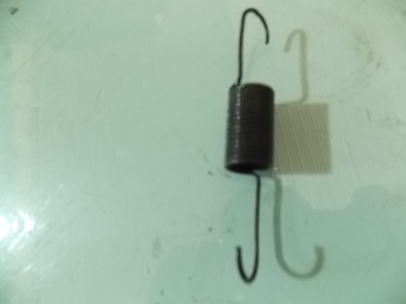 Clutch booster return spring