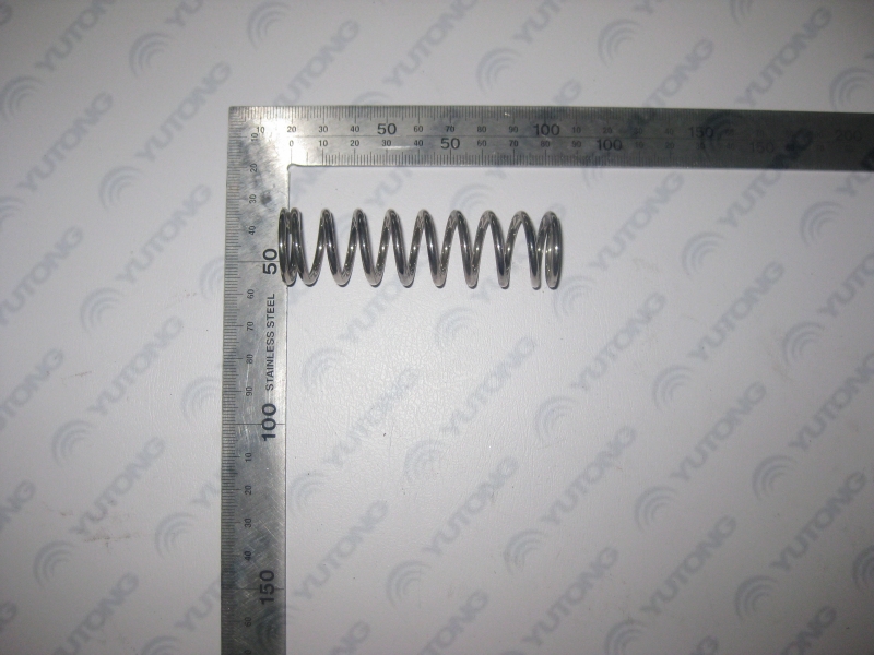 Clutch pedal return compression spring; silver-white, same as 8600-01593