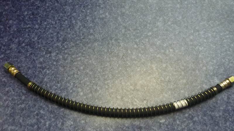 Clutch booster air intake hose assembly