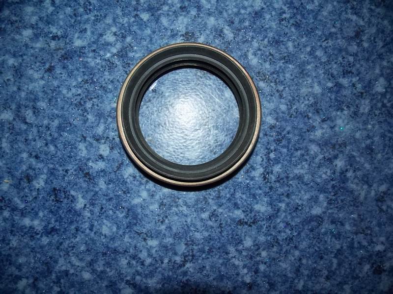 Two-axis oil seal