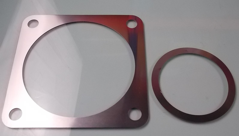 Регулировочная прокладка крышки заднего подшипника промежуточного вала 0. 007