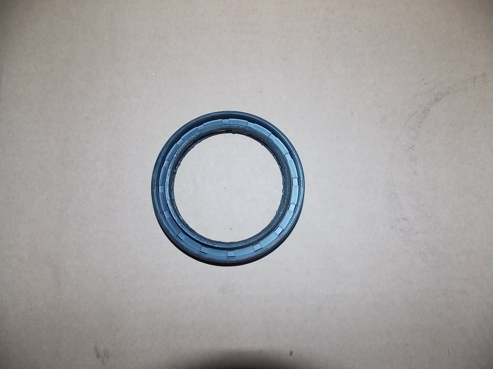 Two-axis oil seal