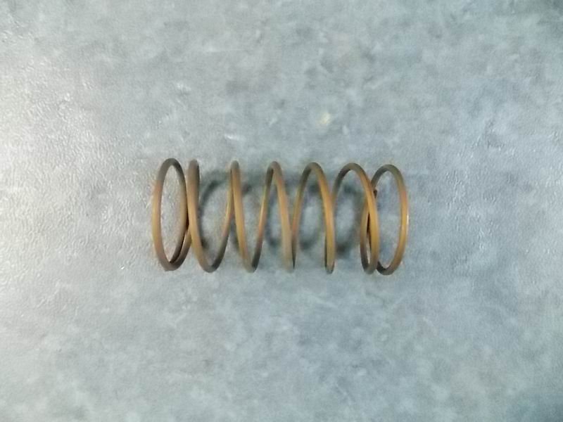 Large spring for gearshift shaft return position