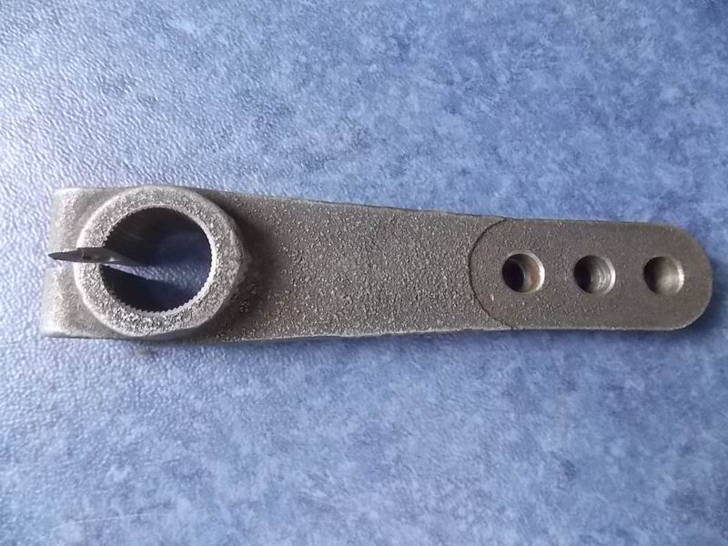 Separating fork shaft and arm