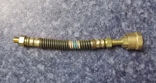 Clutch separation bearing lubrication hose assembly