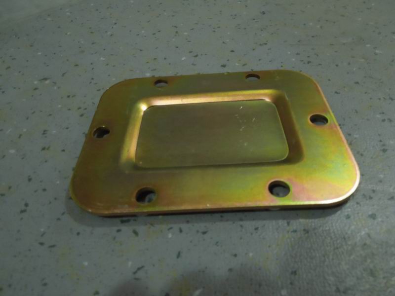 Reverse check hole cover