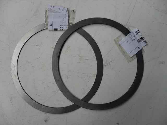 Adjustment gasket - one axis