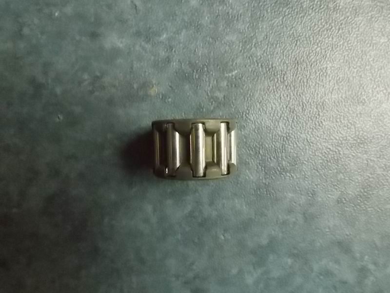 Needle roller bearing between one and two shafts