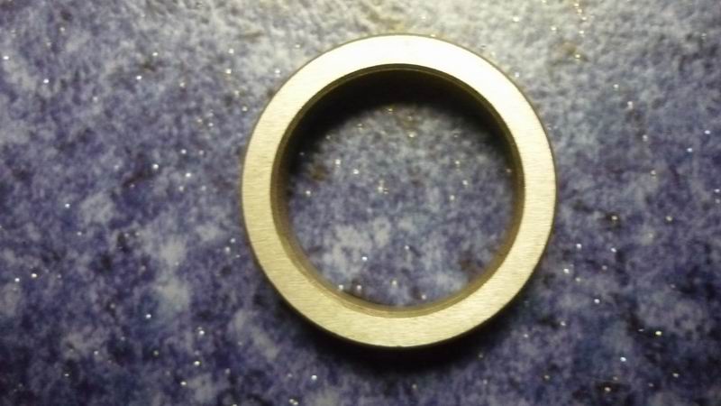 Odometer sensing ring gear rear spacer