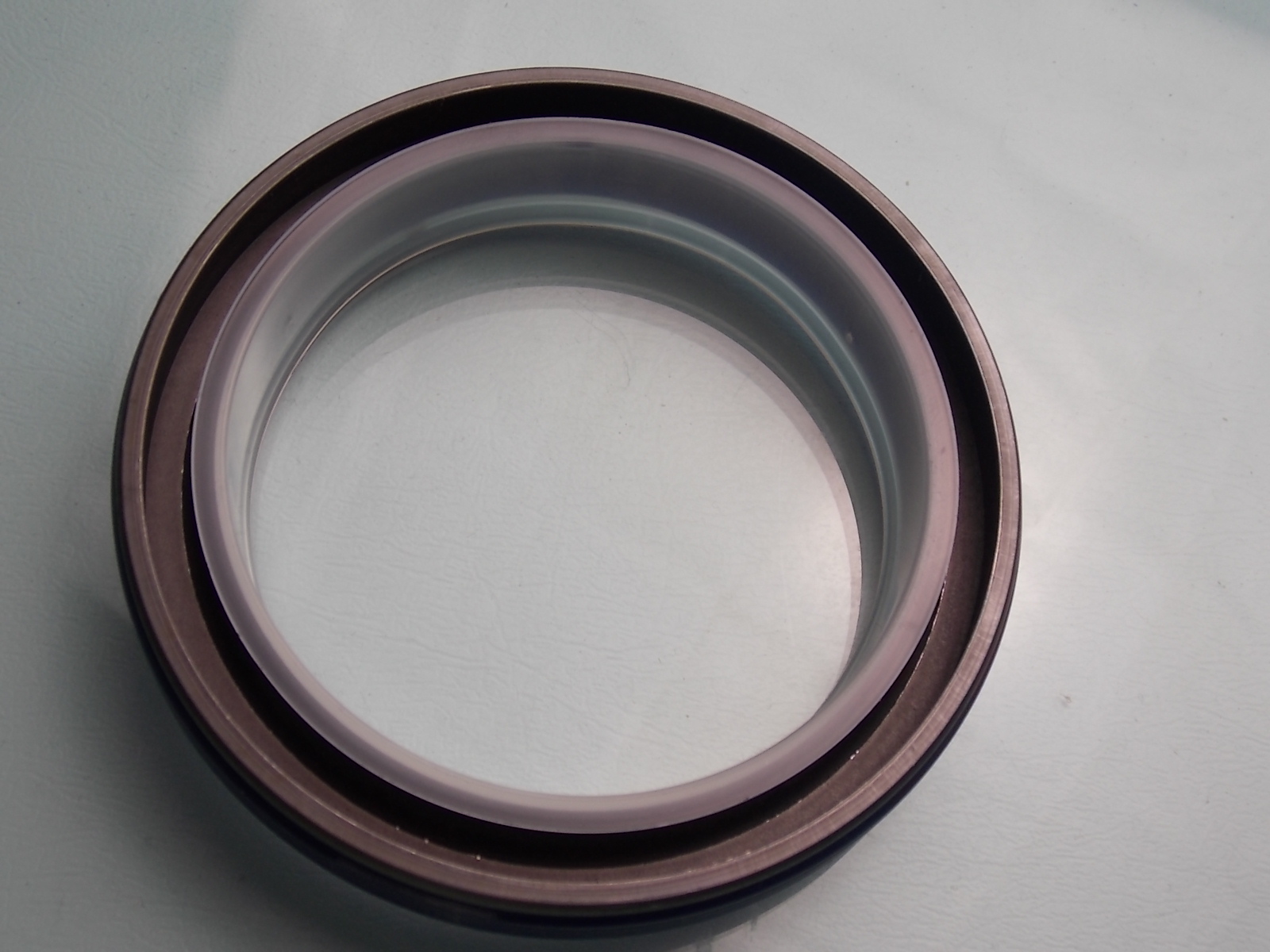 Two-axis oil seal; consume inventory-1