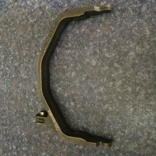 Reverse gear shift fork assembly