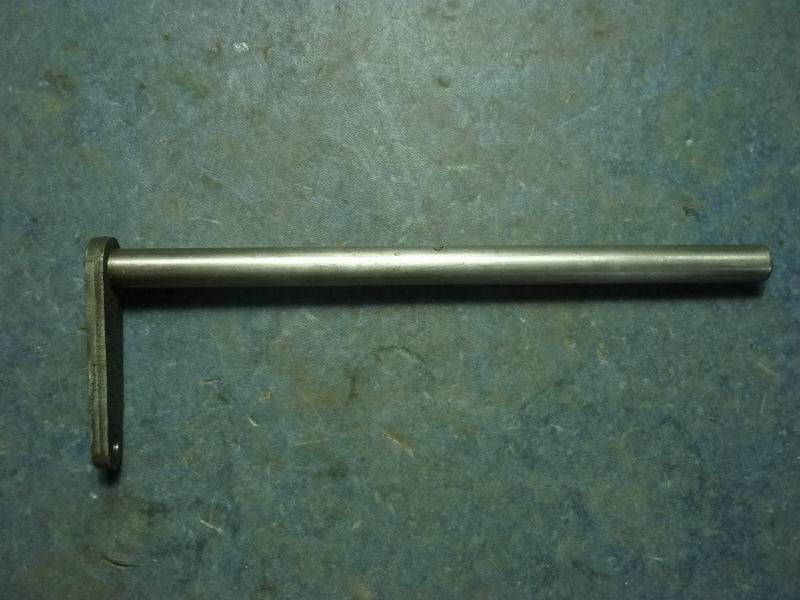 Separating fork shaft and arm assembly