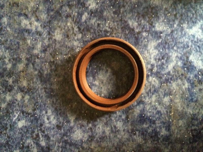Shift shaft oil seal; 28.5*40*10-3