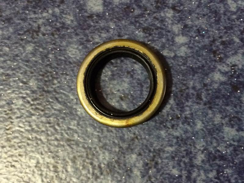 Shift shaft oil seal assembly-1