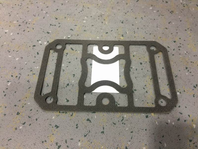 Air compressor cylinder head pad