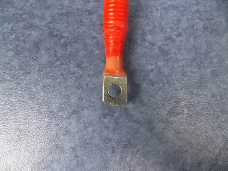 Orange high voltage line 50-900-1008 right side capacitor + insurance +-1