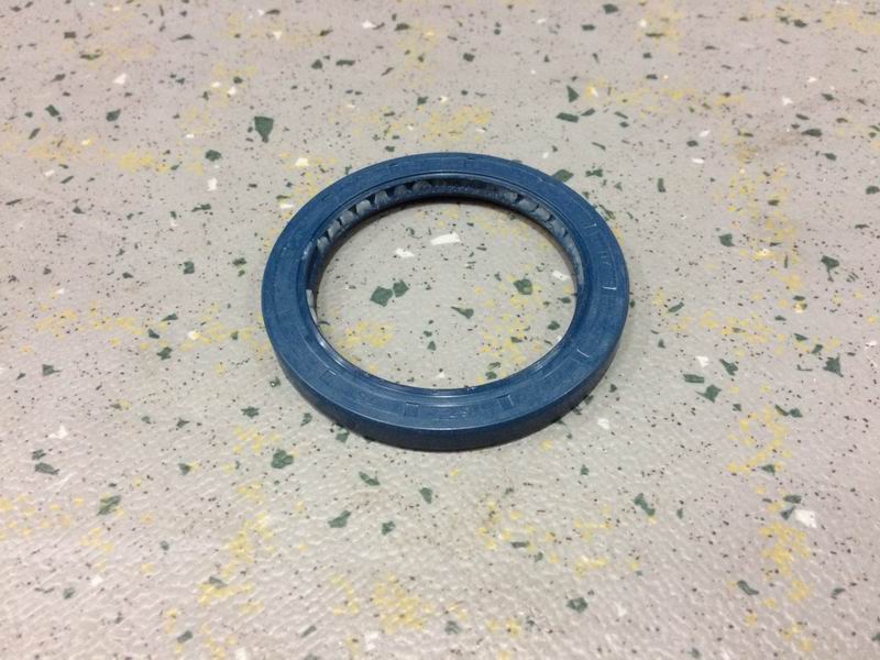 Oil seal under steering knuckle