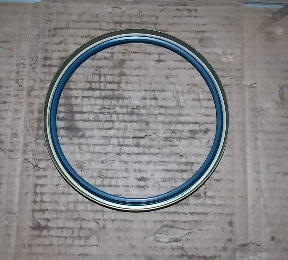 Wheel oil seal, used in conjunction with 2305-00151; brown