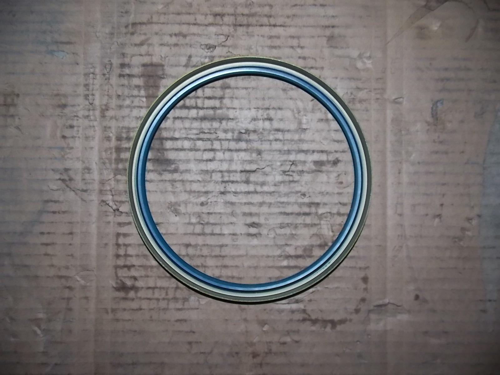 Wheel oil seal, used in conjunction with 2305-00151; brown-1