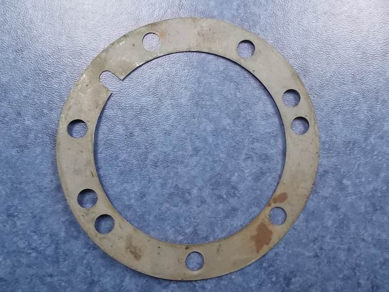 Регулировочная прокладка активного конического подшипника; потреблять инвентарь