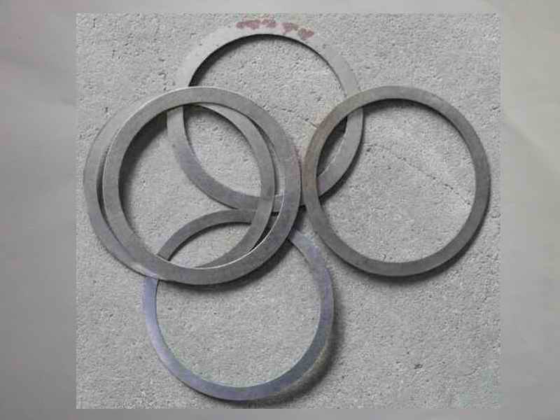 Active bevel bearing adjustment gasket; including 4 pieces