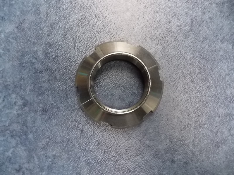 Slot nut-active bevel gear